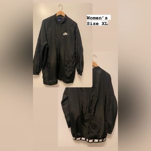 Women’s Nike XL black logo windbreaker long jacket.